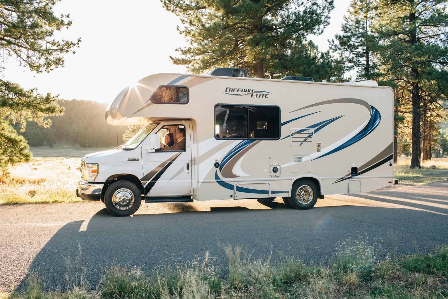 A cozy home on wheels, parked on the side of a road.