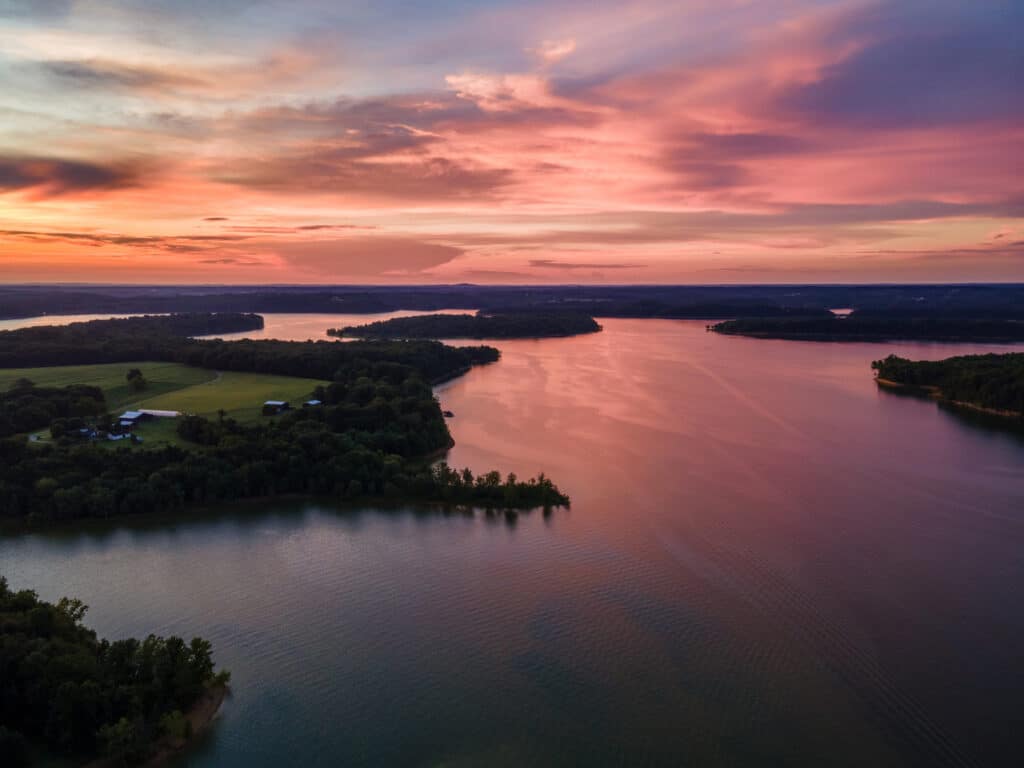 A picturesque lake with islands and trees in Kentucky.