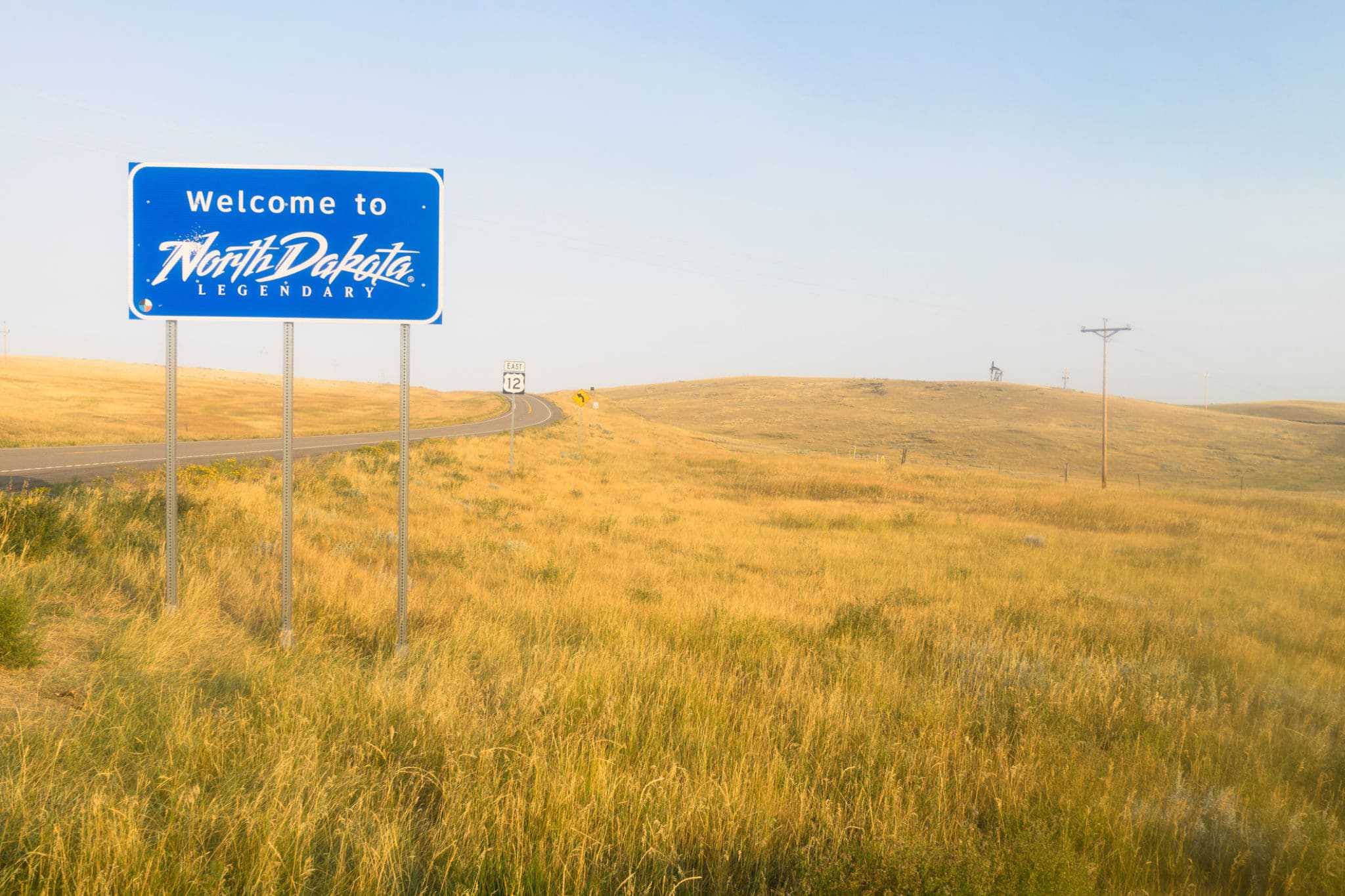 A welcome sign on a road in North Dakota.