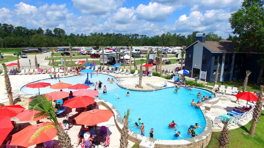An aerial view of an RV park swimming pool in Louisiana.