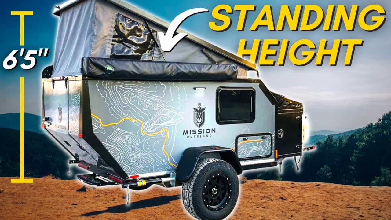 An image of a Stand-Up Camper explicitly designed to fit in the garage, with the words "standing height" clearly visible on it.