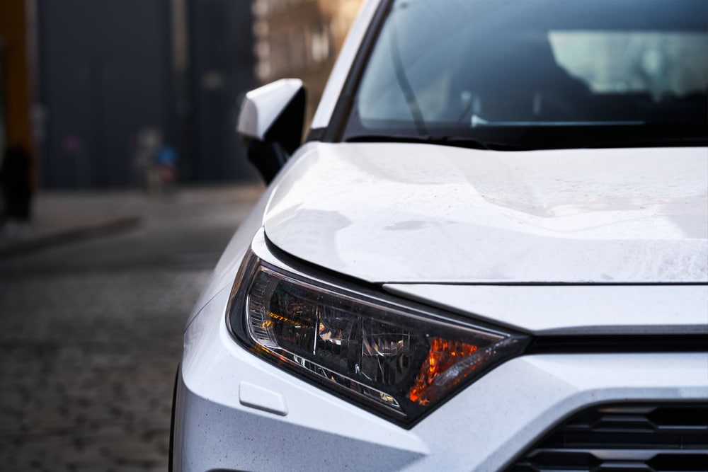 The average transaction prices for a new-vehicle front end of a white 2019 Toyota Rav4.