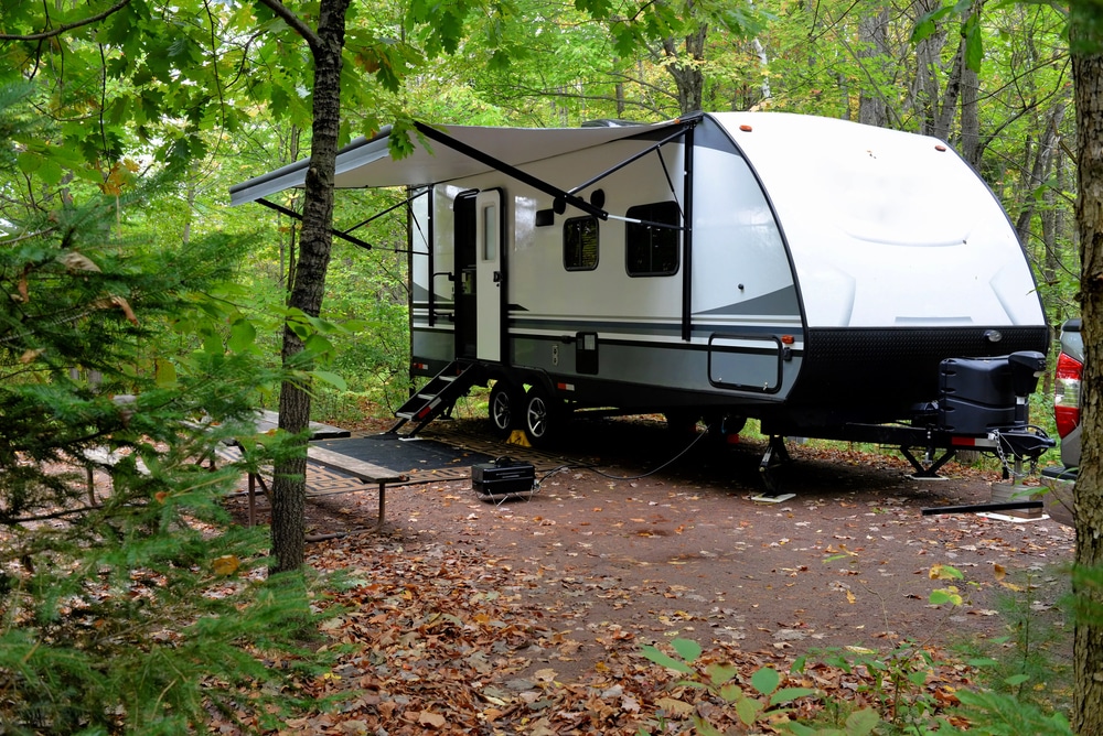 DexKo Global, a leading company in the recreational vehicle industry, recently acquired National Trailer Parts Warehouse. Now, an upgraded RV is stationed in a picturesque wooded area.