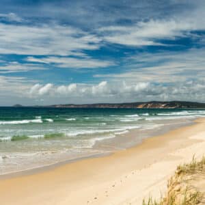 A sandy beach with sand dunes in Queensland.
