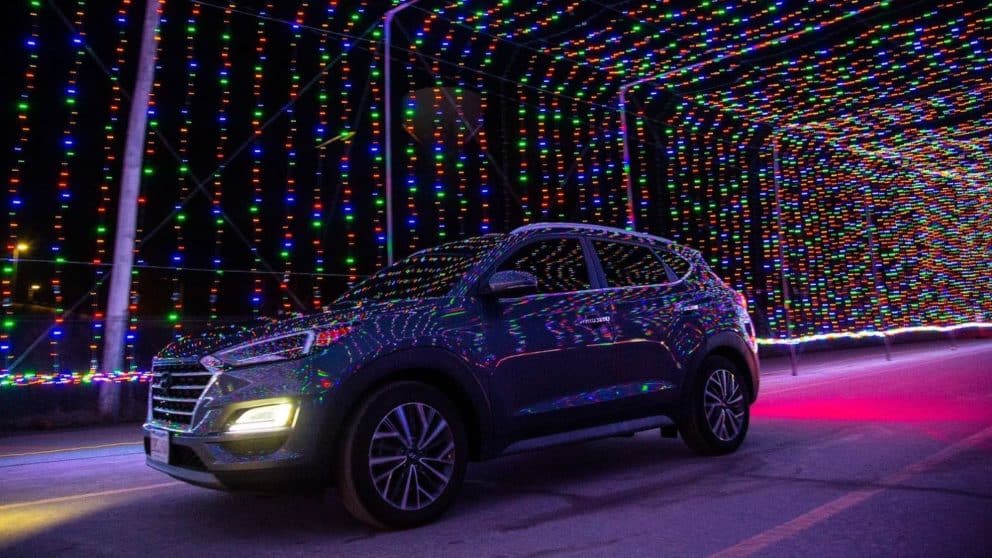 Experience the holiday tradition with the Hyundai Santa Fe as you drive-through the enchanting Magic of Lights Ottawa.