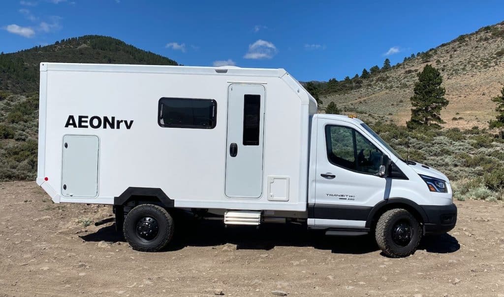 The AEONrv is parked on a dirt road.