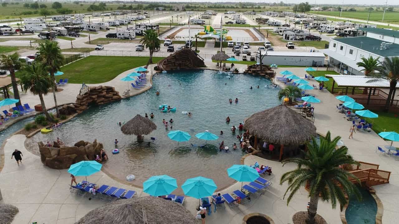 An aerial view of a swimming pool at an RV park.