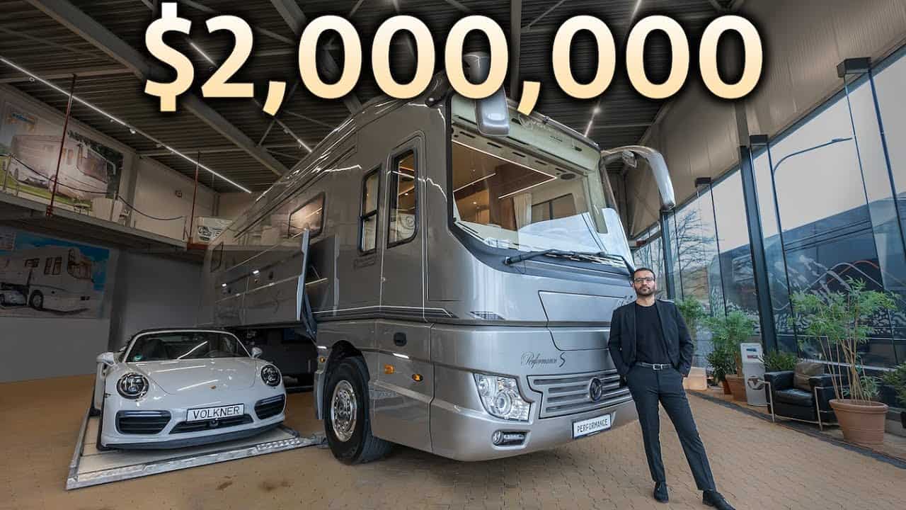 A man is standing in front of a luxury motorhome with the words $2,000,000.