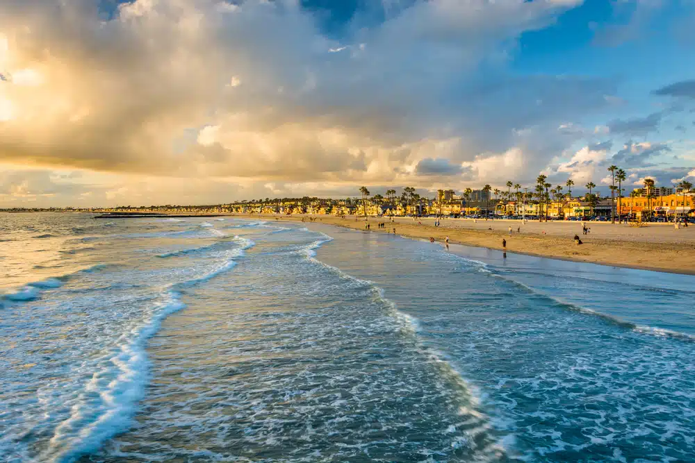 Visit the beach at sunset in San Diego, California.