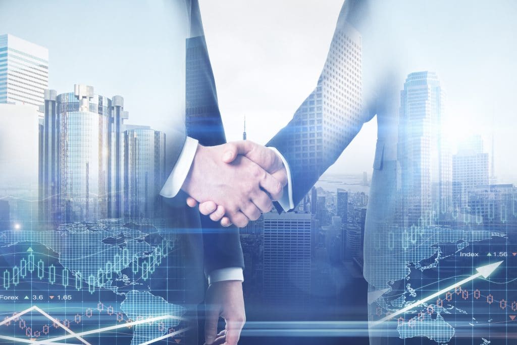 Two businessmen shaking hands in front of a city background, overseeing the acquisition of land for outdoor recreational opportunities and camping.