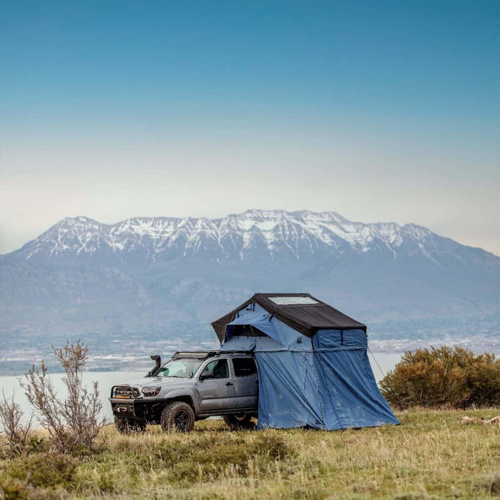 A Toyota pickup truck with a Cascadia Vehicle Tents on top of it.