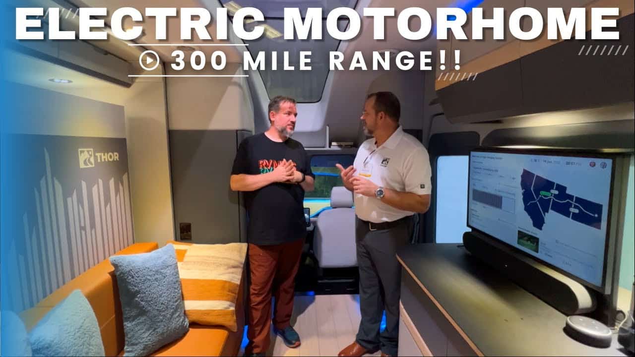 Two men on Thor's RV tour in an electric motorhome with a 300 mile range.