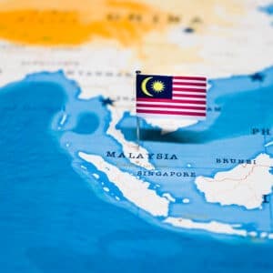 Malaysia flag on the map of Malaysia - a popular tourist attraction.