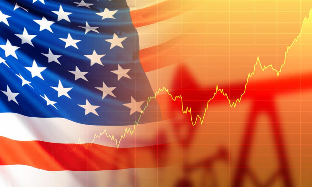 A stock chart depicting the US Economy during the 2020 Recession, with an American flag in the background.