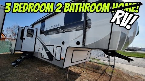 A Coachmen Chaparral 373MBRB RV, equipped with three bedrooms and two bathrooms, is available for a comfortable mobile home experience.