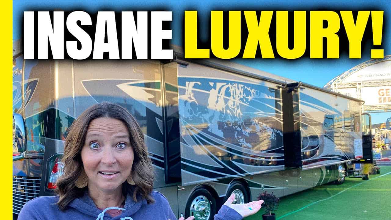 A woman is standing in front of an RV, the Fleetwood Discovery XLE 44B, with the words "insane luxury".