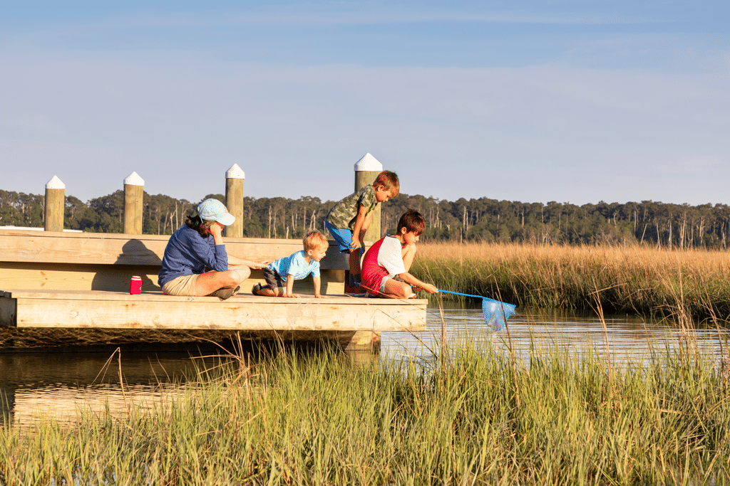 A group of people on an open dock at Chincoteague Island.