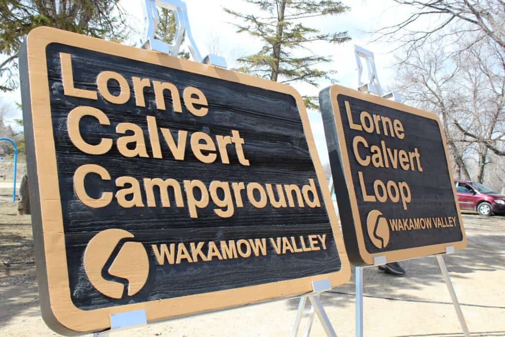 Two Lorne Calvert Campground signs.