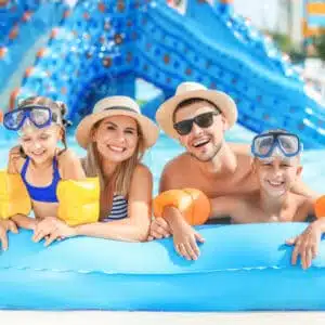 Family having fun at the Jellystone Park water park in New Hampshire.