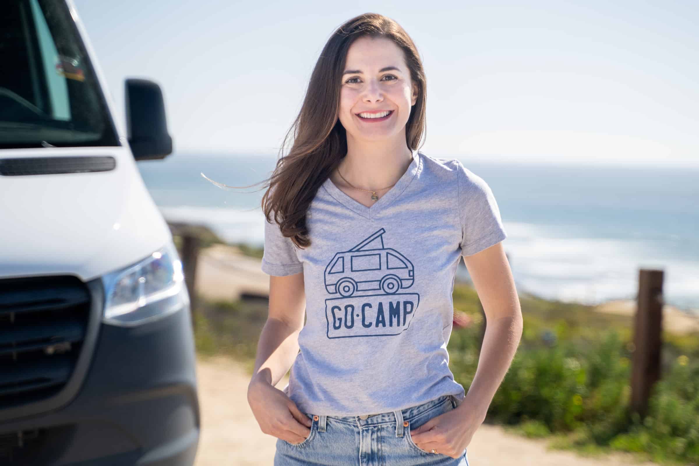 Camila Ramirez, CEO of GoCamp, wearing a t-shirt that says "be camp.