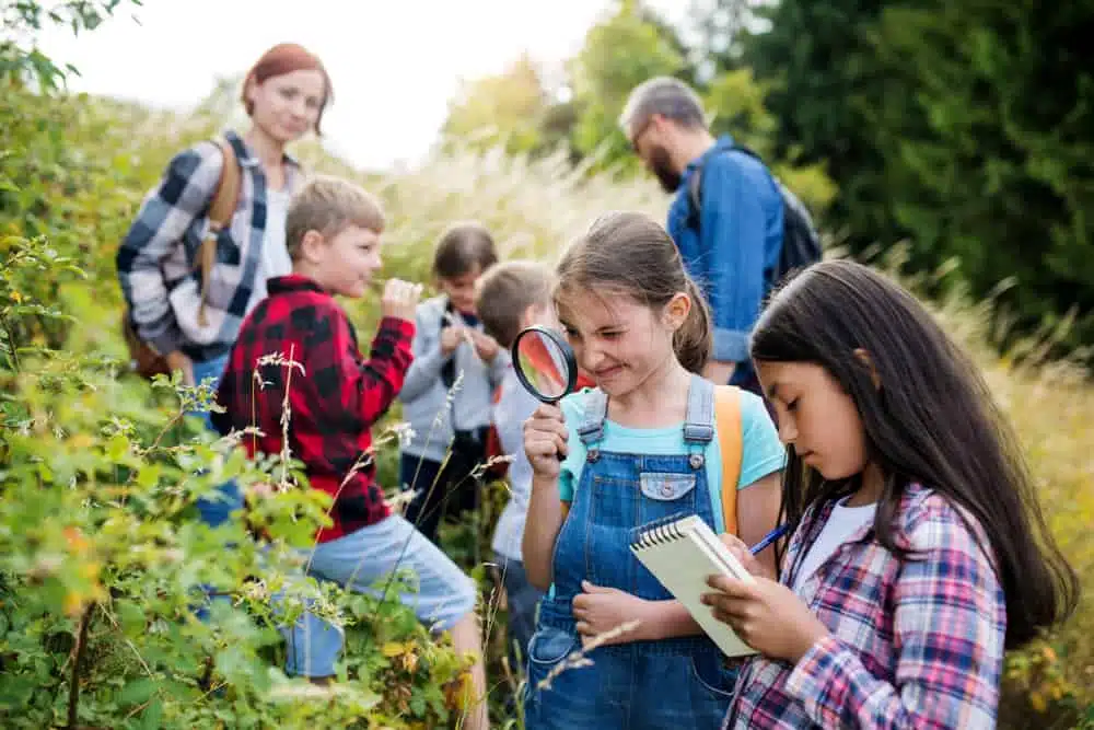 A group of children participating in activities and exploring nature at Virginia State Parks on National Kids to Parks Day.