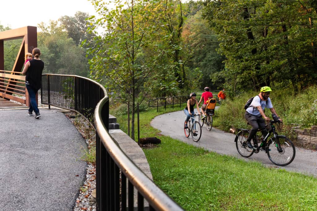 The Safety Front and Center group of people riding bikes on a trail.