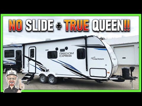 A 2022 Freedom Express 20SE travel trailer in white and black with the words "no slide" and a true queen bed.