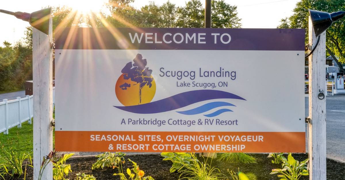 A sign that says welcome to Scugog Landing RV Park.