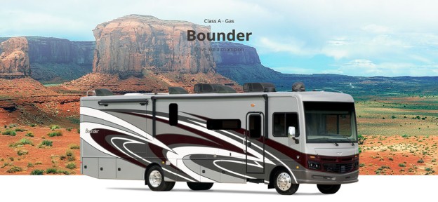 The Fleetwood RV, affectionately known as the bounder, is parked in front of a stunning red rock formation.