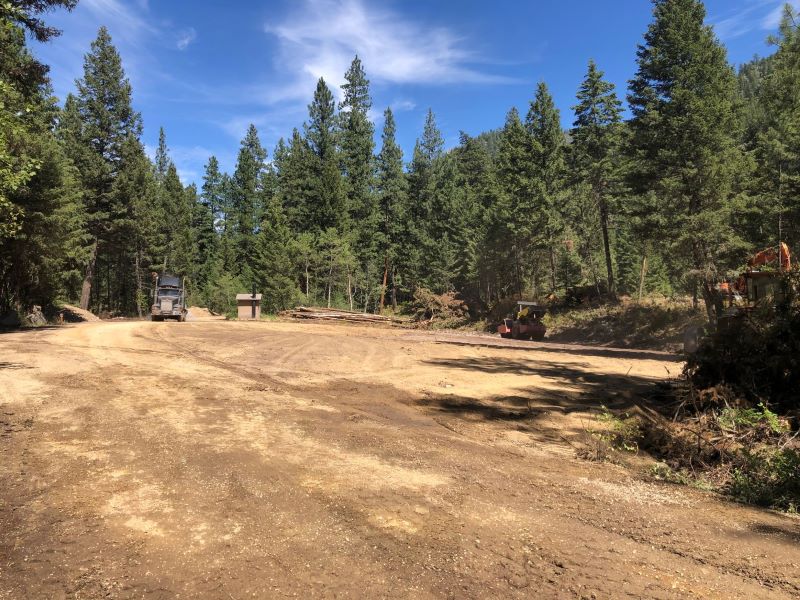 Maintenance on Rock Creek Road, a dirt road in the middle of a forest near Harry's Flat Campground.