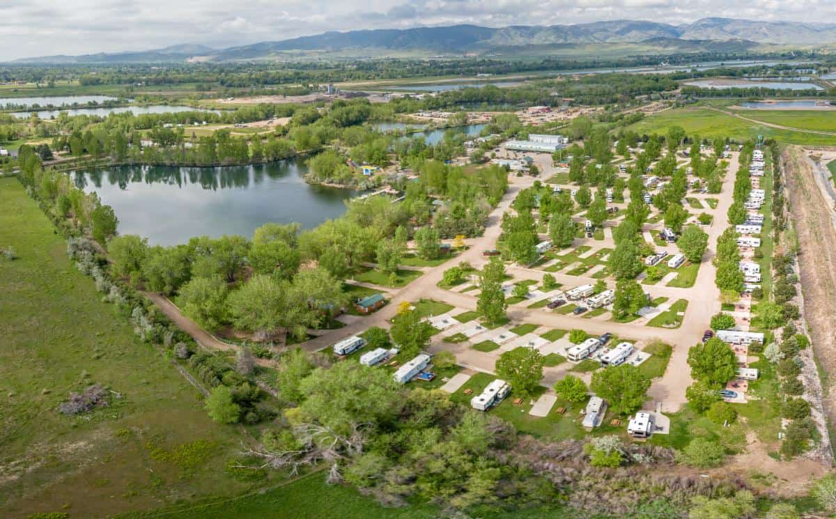 An aerial view of a KOA Campground near a lake in Colorado.