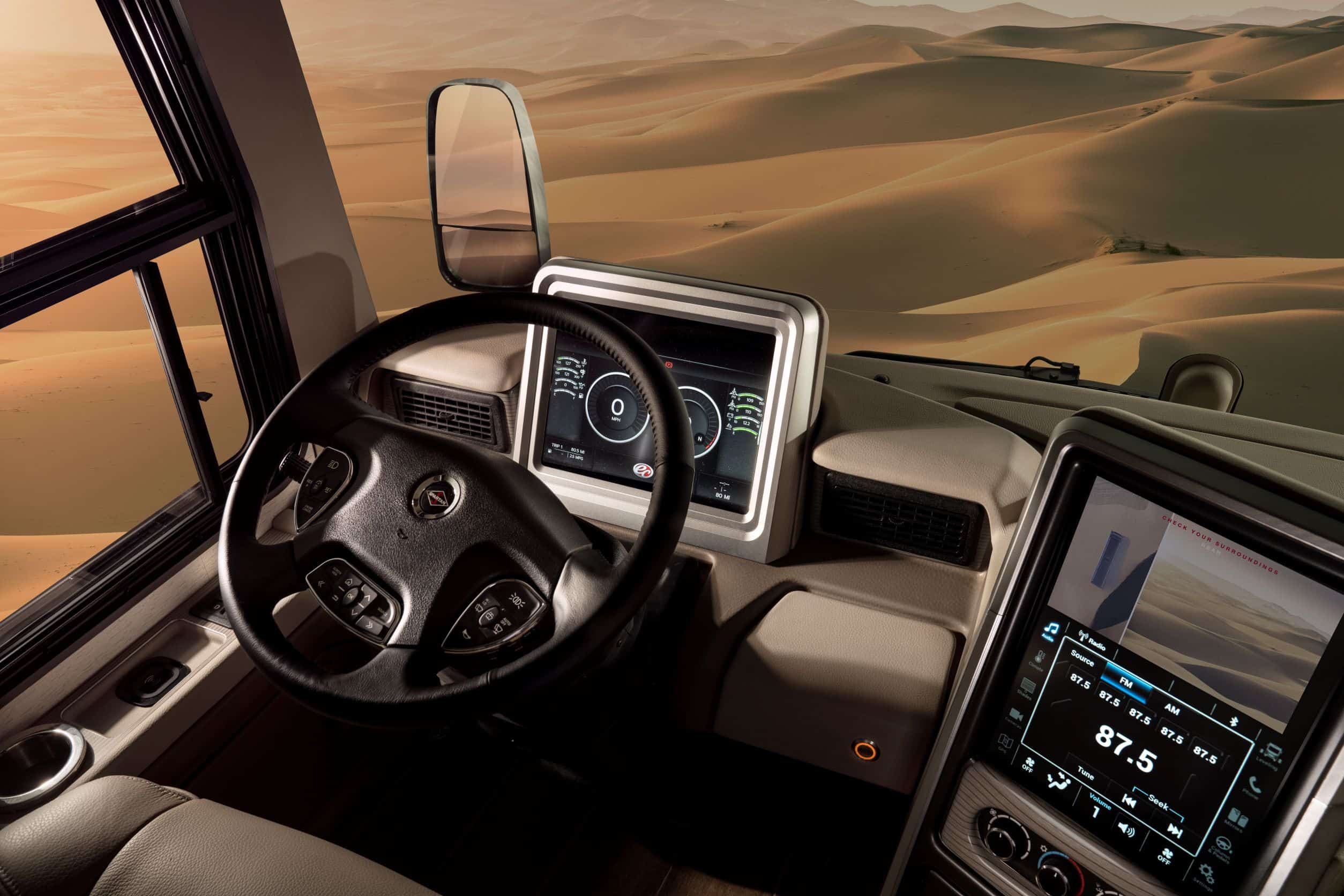 The interior of a truck with a Spartan RV Chassis and Tri-Pod Steering Wheel.