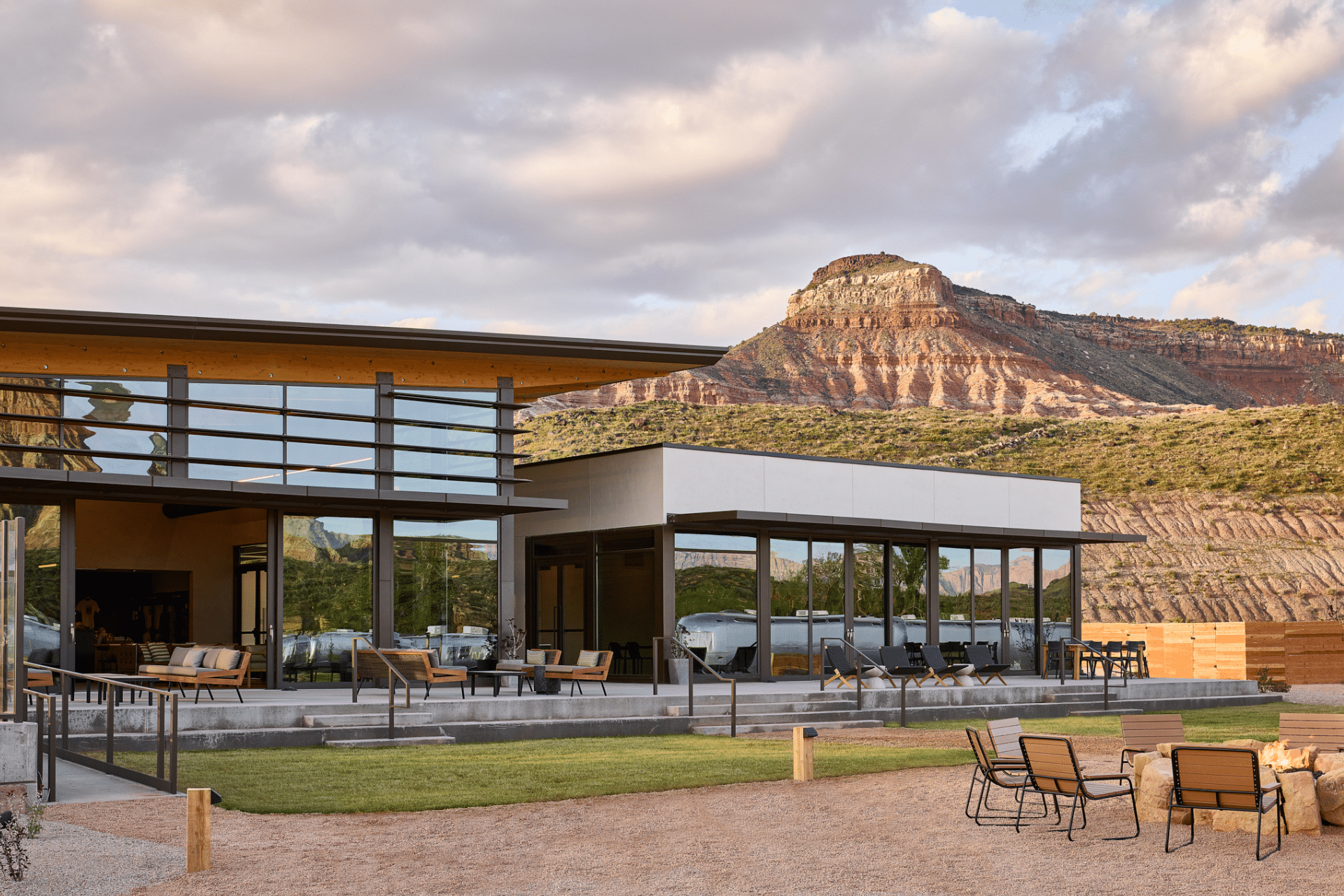 An outdoor dining area with a mountain in the background at Zion National Park.