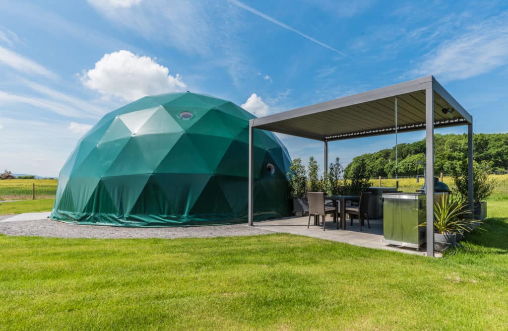 Angrove Country Park, a green dome, sitting on a grassy field, welcomes visitors to enjoy its new lodges after the £1M investment.