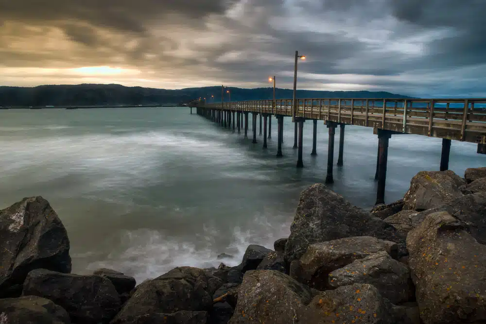 A pier with rocks in the water that is subject to a lease agreement.