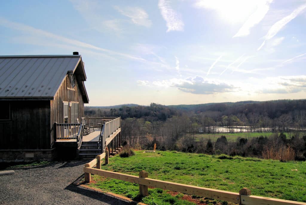 A quaint house on a hill, providing a serene outdoor nighttime experience.