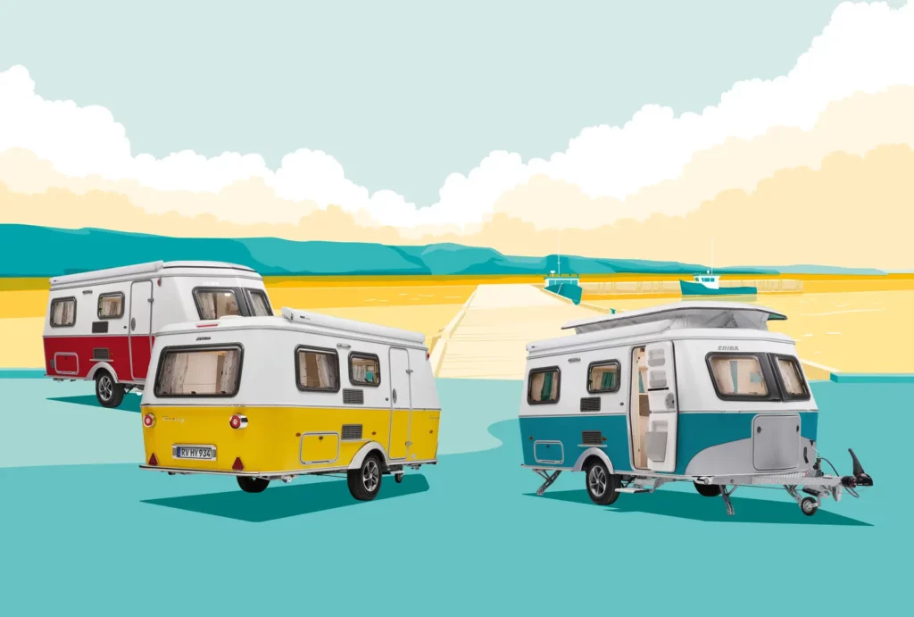 Three spacious camper vans parked on a vibrant beach.