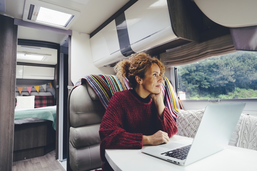 A Gen Z woman enjoying the ultimate side hustle while RVing.