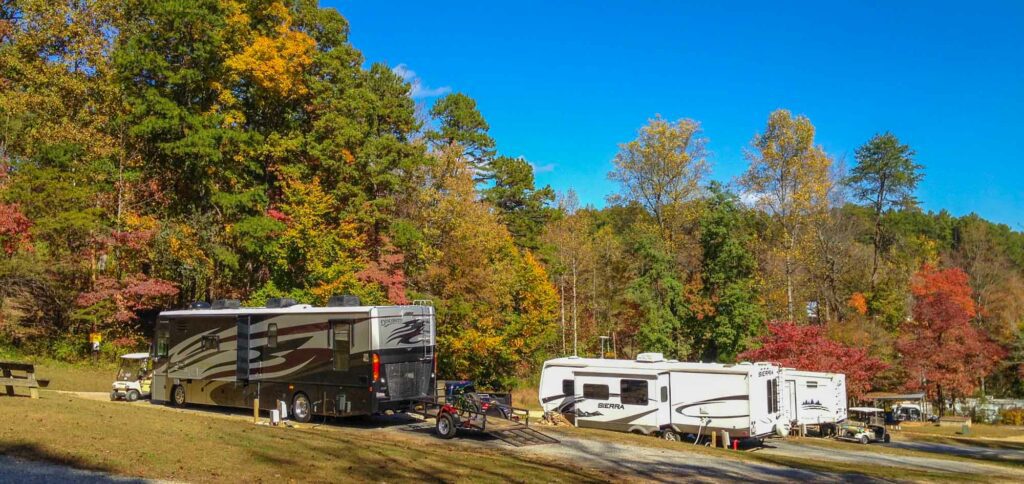 Spacious Skies Campgrounds, a picturesque RV park nestled in a wooded area.