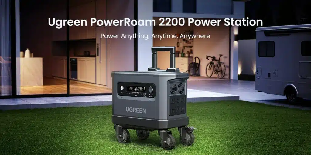 A Ugreen portable power station, called PowerRoam 2200, sits in front of a house, providing convenient power accessibility.