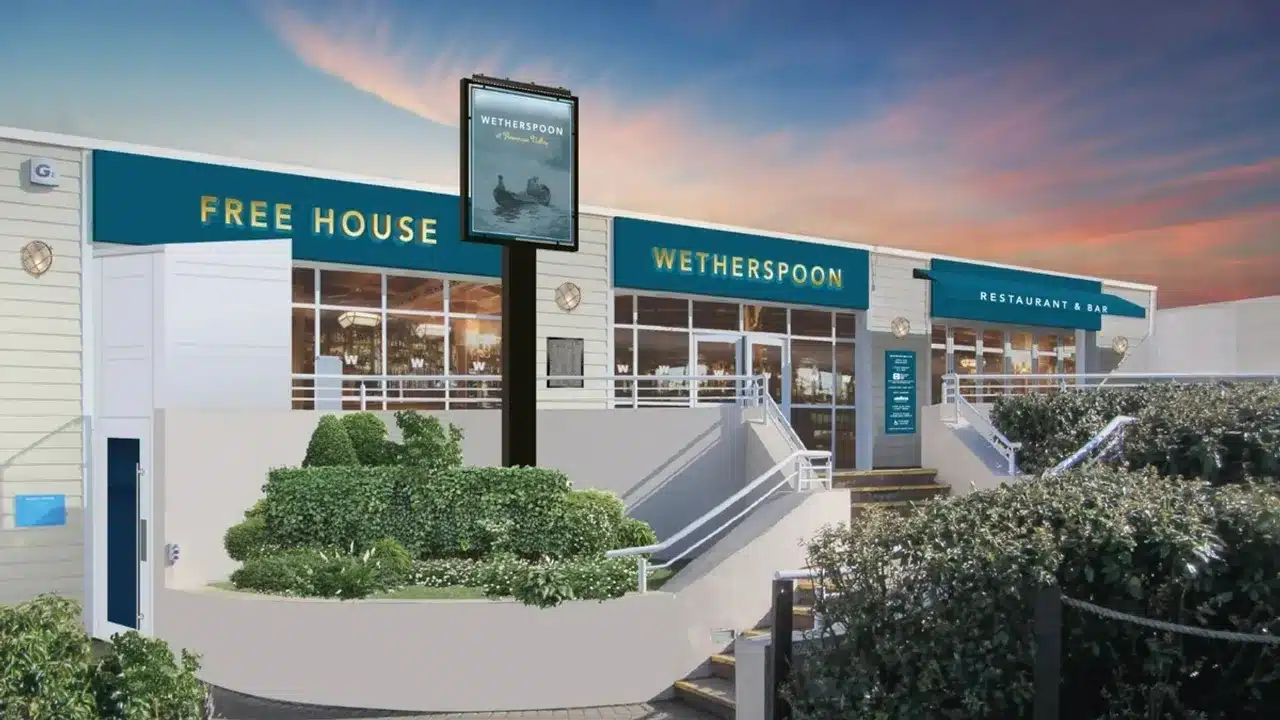 A rendering of a building with a sign that says free house, offering a unique UK holiday parks vacation experience.